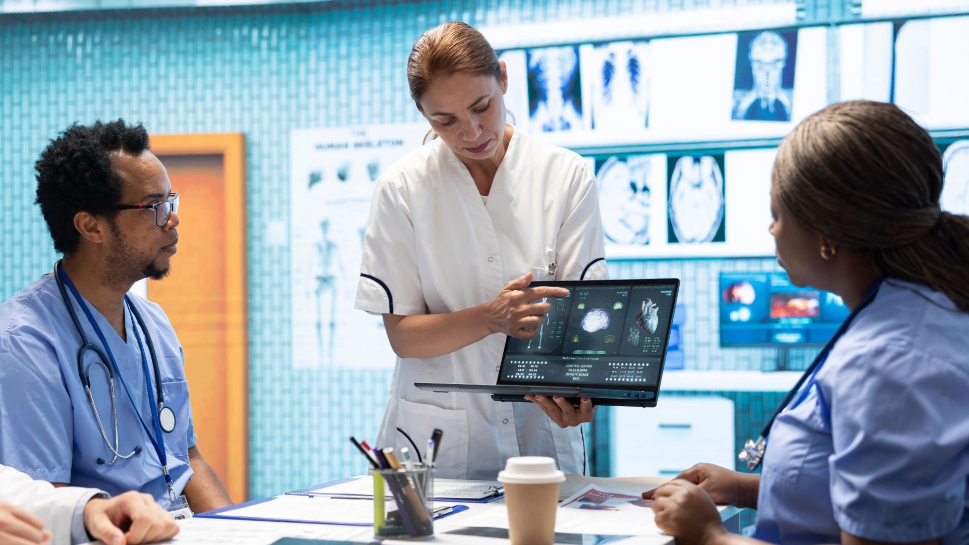 A modern hospital scene with doctors or nurses interacting with digital dashboards, tablets, or medical devices.
