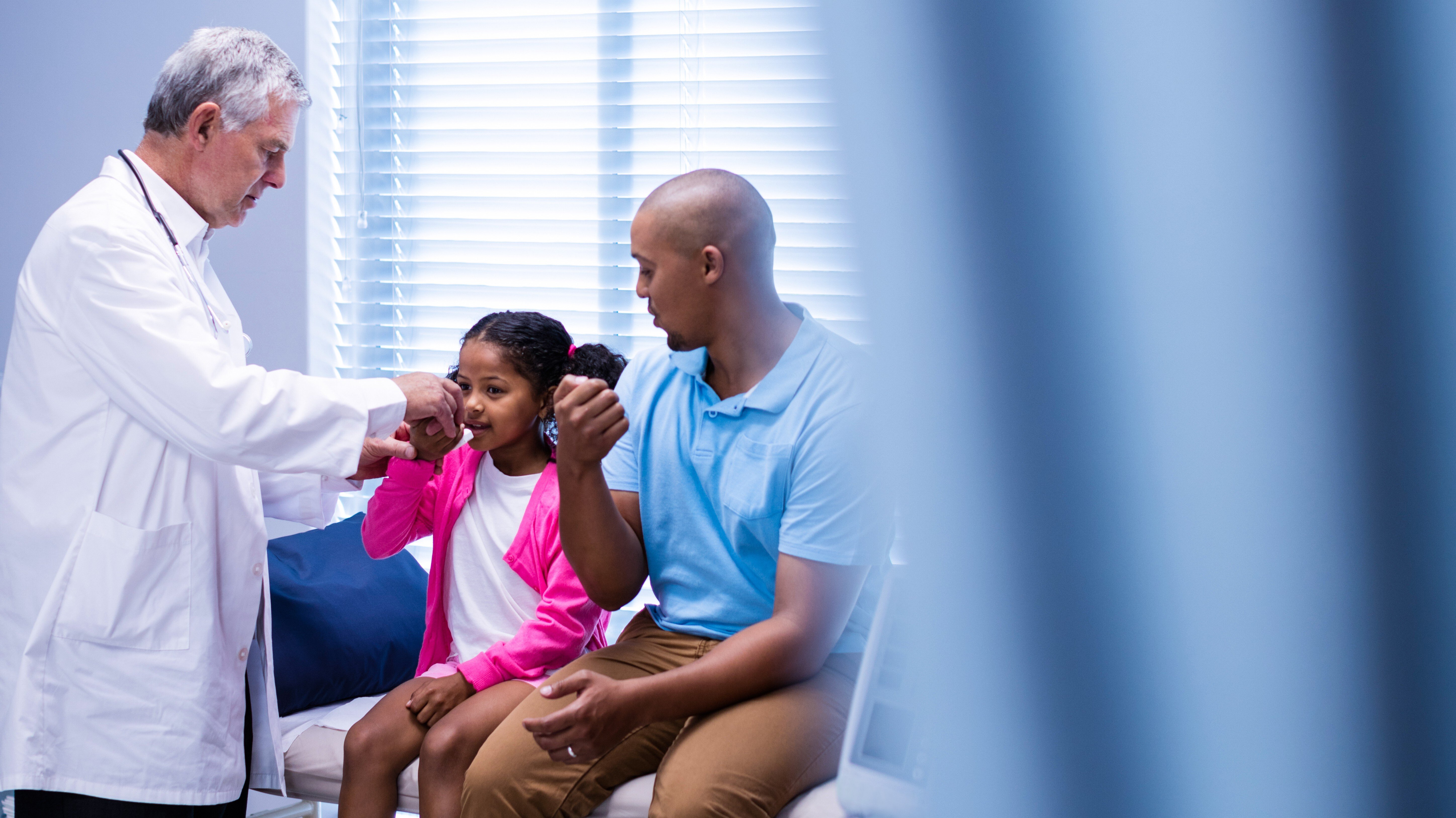 Doctor examining patient