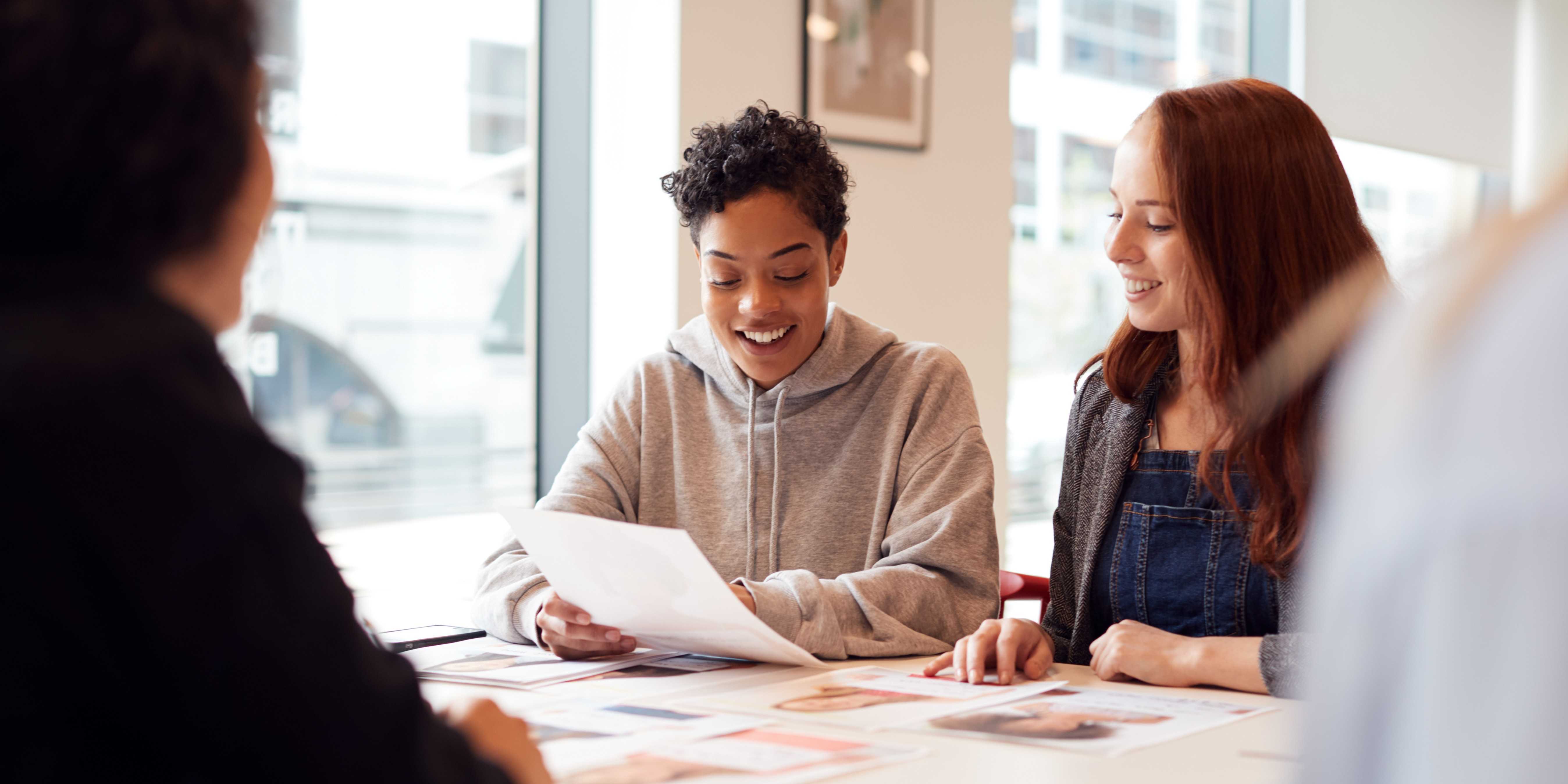 Business Meeting with Smiling Colleagues in an Office